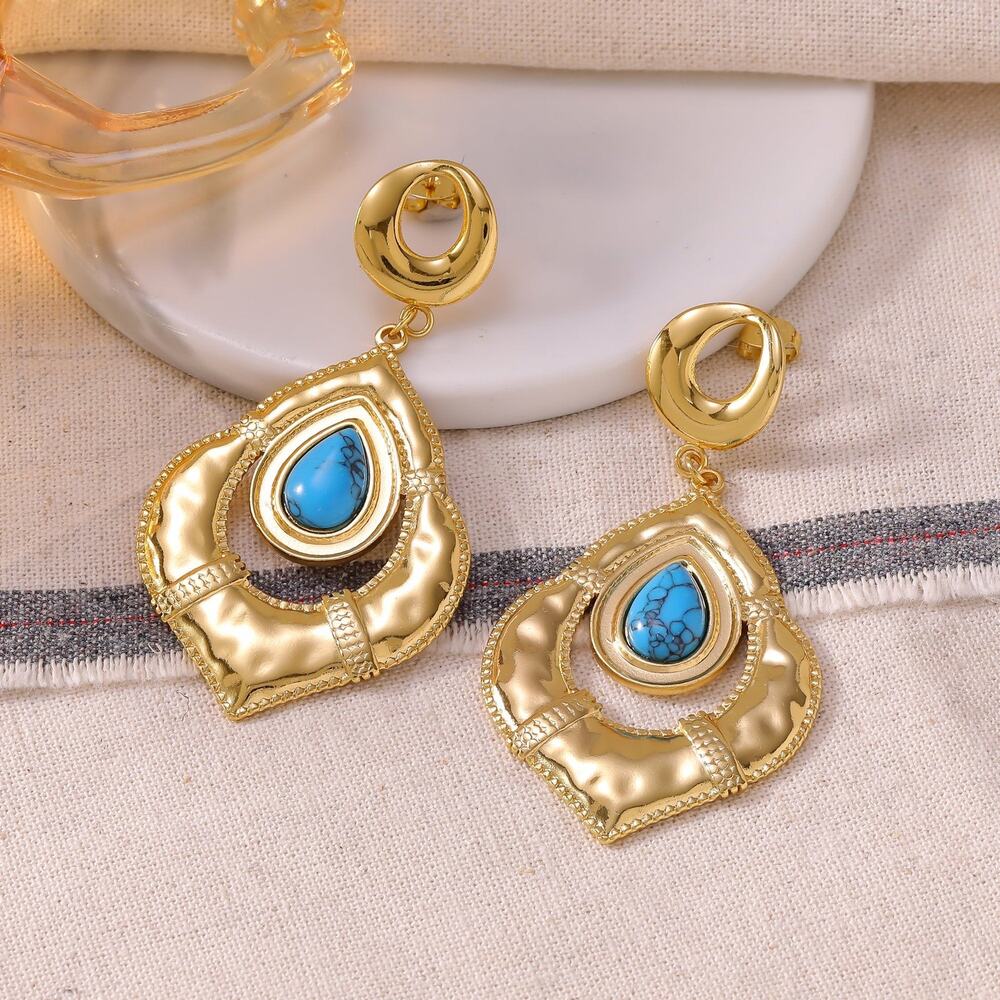 Pierced 2 3/4" matte gold and turquoise stone hammered teardrop earrings